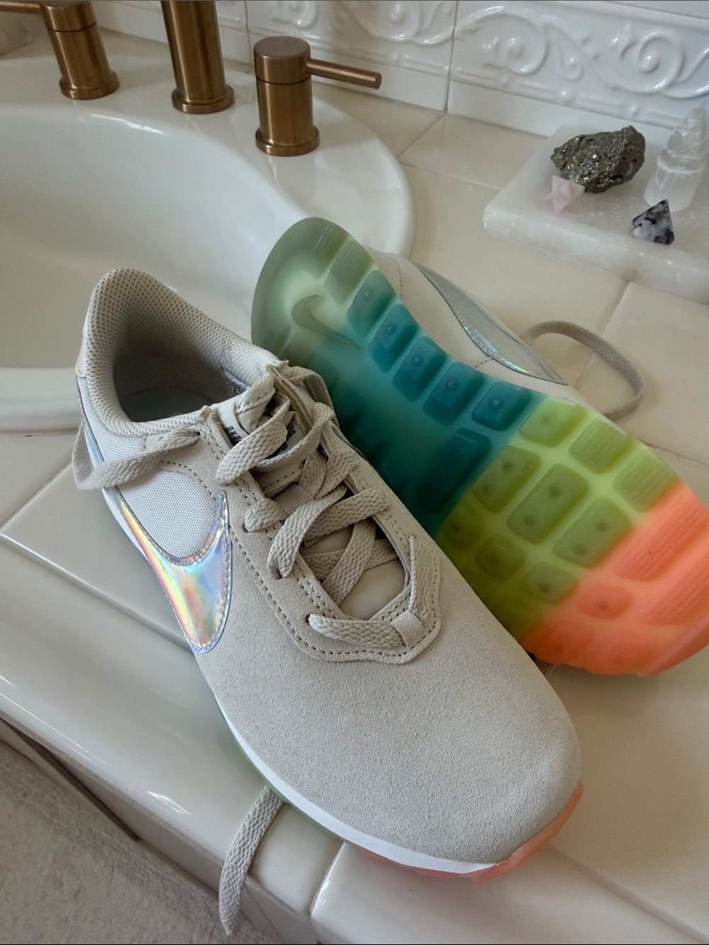 Nike Beige Suede Sneaker with Iridescent Swoosh and Rainbow Sole.